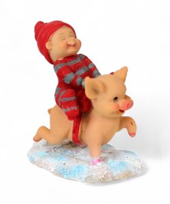 babynisse dreng der rider på julegris 10 centimeter