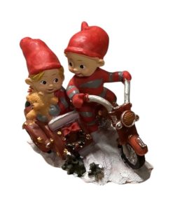 babynisser på flot rød motorcykel