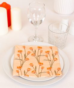 Orange serviet med blomster