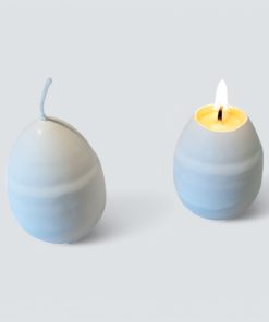 1 styk flot hvid æggelys med gul midte til påskebordet