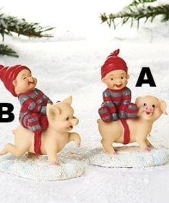 babynisser der sidder på julegris i sne