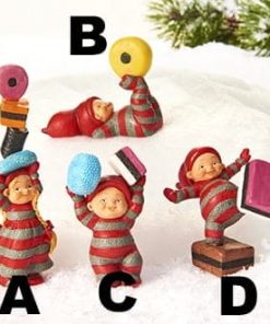 Babynissen mit Lakritze - Mädchen mit Weihnachtssüßigkeiten auf dem Kopf