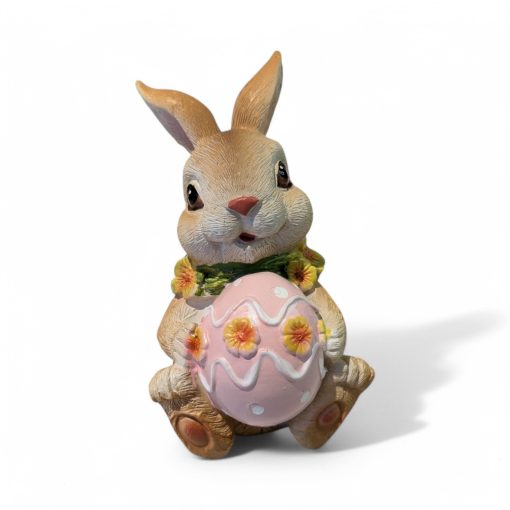 Osterhase aus Polystone mit rosa Osterei. 10 cm. Kann im Freien stehen.