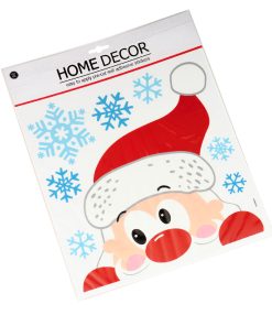 vinduesdekoration med julemanden der kikker ind ad vinduet