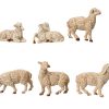 6 styk cremefarvede forskellige får der ligger og står