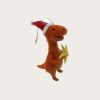 lille t-rex dinosaur på 7 x 15 x 12 centimeter er børnevenlig julepynt