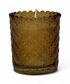 gult glas med stearinlys med duft