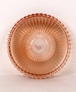 10 centimeter gennemsigtig laksefarvet glasfad med riller