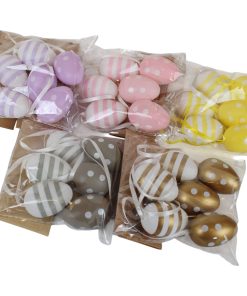 seks styk påskeæg i plastik som fås i flere farver med bånd til ophængning