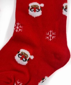 Hælen på rød strømpebuks med julemand