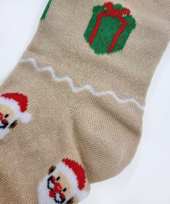 Nærbillede af beige strømpebuks med motiver og hælen